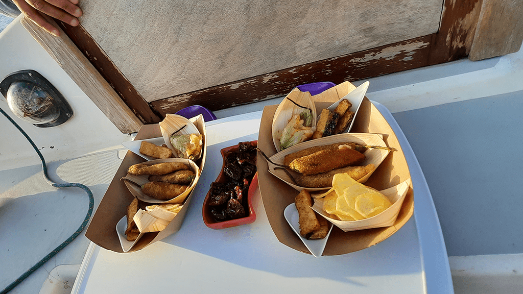 Aperitif on a sailing boat Sardinia